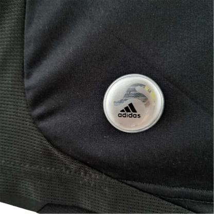https://cdn.shopify.com/s/files/1/0826/7228/8075/files/20092010-real-madrid-bwin-away-retro-kit-110885.webp?v=1741197446