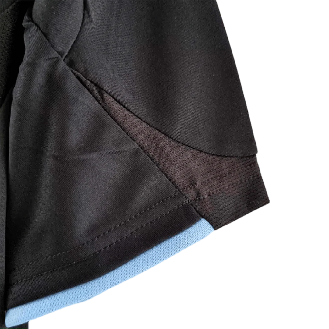 https://cdn.shopify.com/s/files/1/0826/7228/8075/files/20092010-real-madrid-bwin-away-retro-kit-626050.webp?v=1741197447