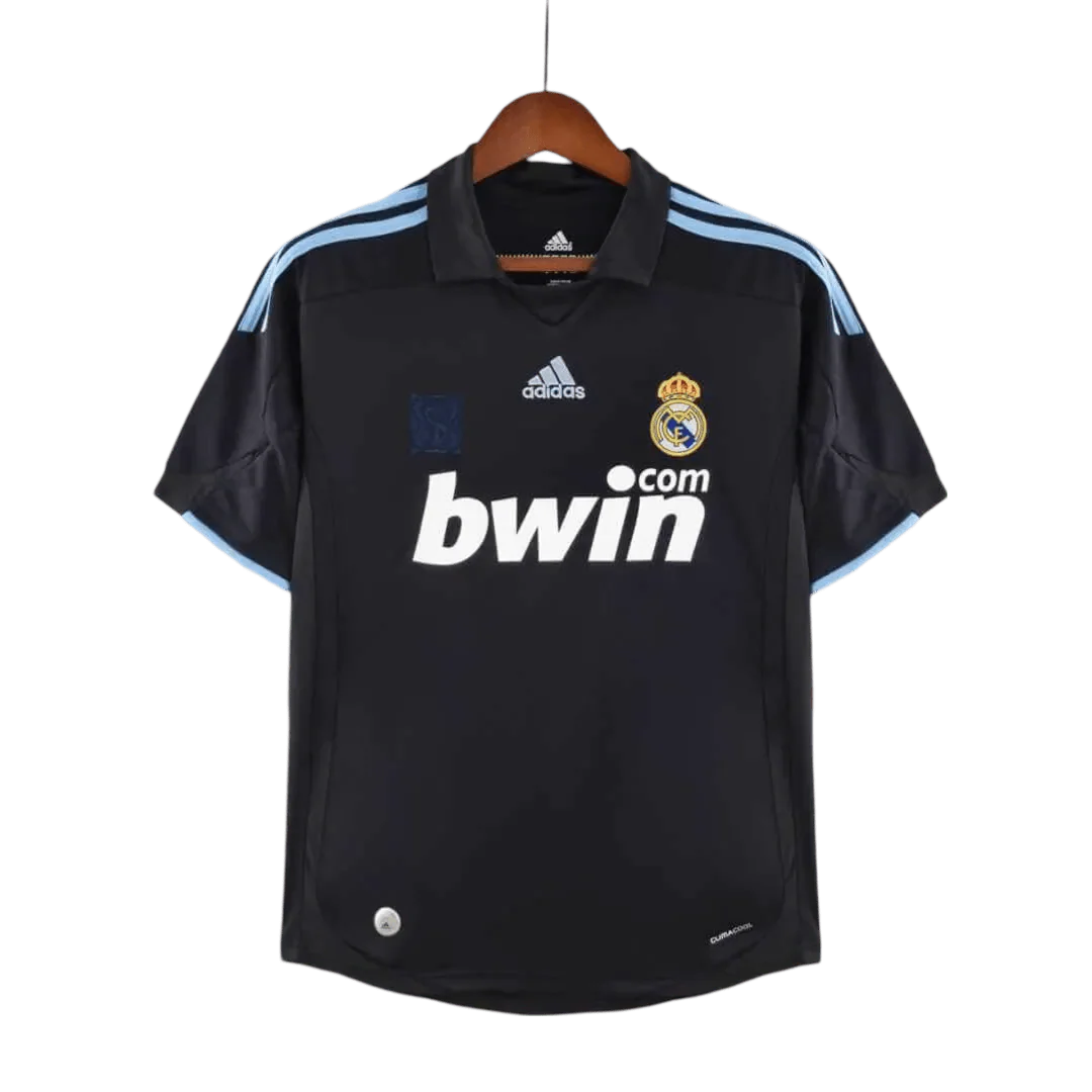 https://cdn.shopify.com/s/files/1/0826/7228/8075/files/20092010-real-madrid-bwin-away-retro-kit-921373.webp?v=1741197446