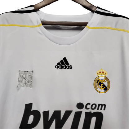 https://cdn.shopify.com/s/files/1/0826/7228/8075/files/20092010-real-madrid-bwin-home-retro-kit-102263.webp?v=1741197457