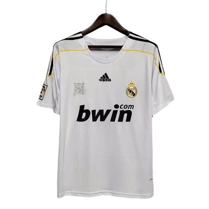 https://cdn.shopify.com/s/files/1/0826/7228/8075/files/20092010-real-madrid-bwin-home-retro-kit-672008.webp?v=1741197454