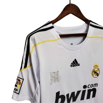 https://cdn.shopify.com/s/files/1/0826/7228/8075/files/20092010-real-madrid-bwin-home-retro-kit-873887.webp?v=1741197456