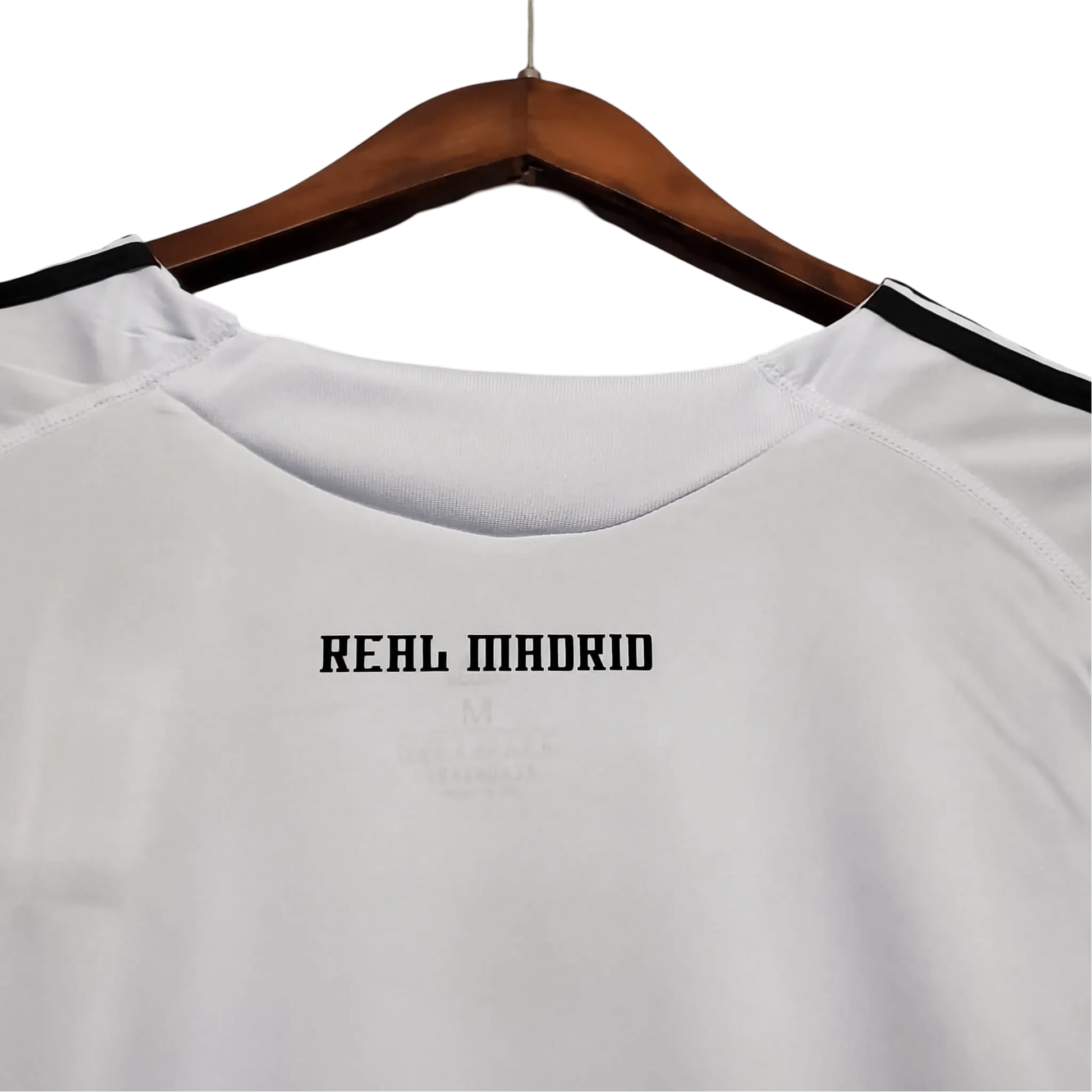 https://cdn.shopify.com/s/files/1/0826/7228/8075/files/20092010-real-madrid-bwin-home-retro-kit-918731.webp?v=1741197454