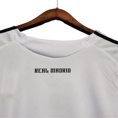 https://cdn.shopify.com/s/files/1/0826/7228/8075/files/20092010-real-madrid-bwin-home-retro-kit-918731.webp?v=1741197454