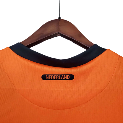 https://cdn.shopify.com/s/files/1/0826/7228/8075/files/2010-netherlands-world-cup-home-retro-kit-classickits433-427006.webp?v=1741198797