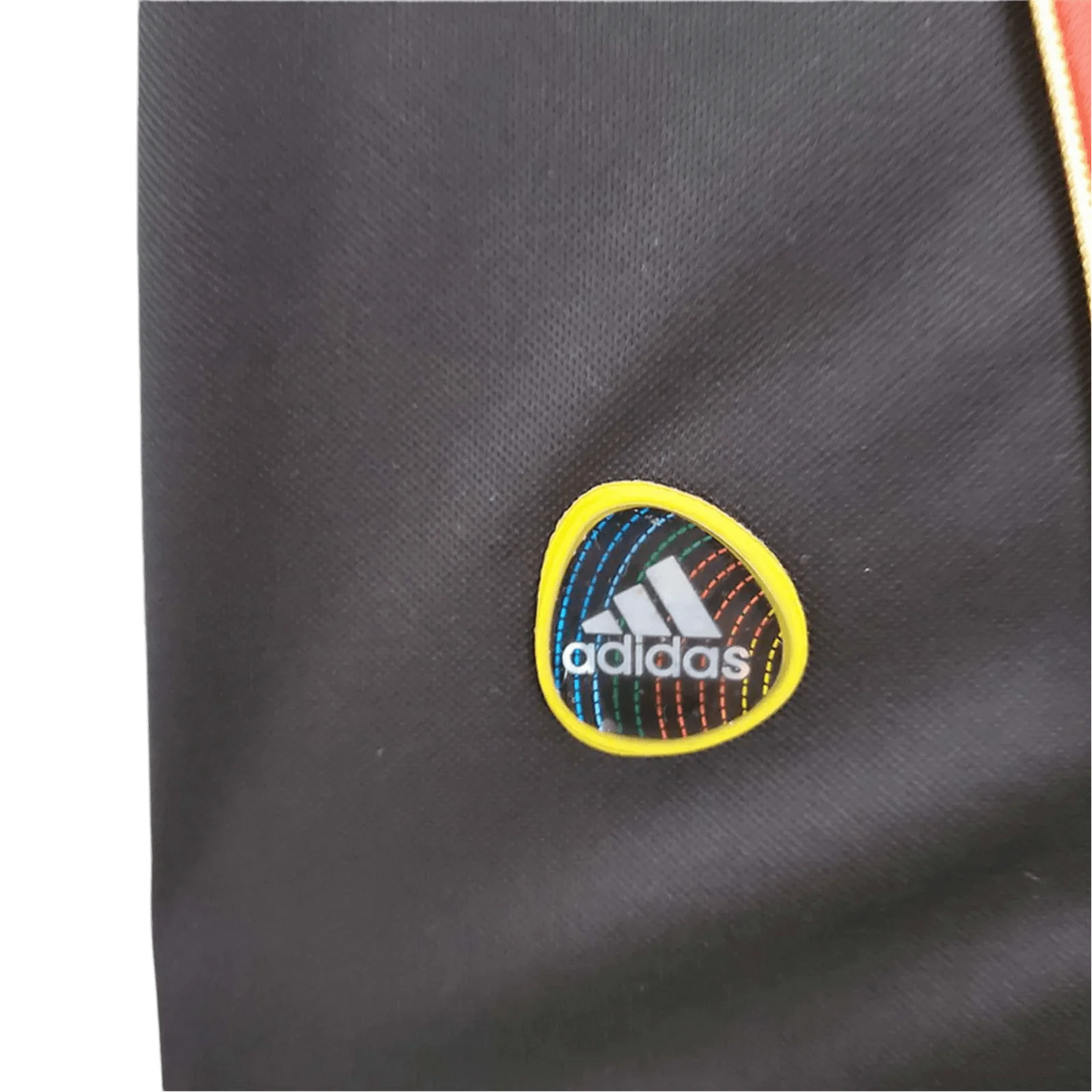 https://cdn.shopify.com/s/files/1/0826/7228/8075/files/20102011-ac-milan-fly-emirates-home-retro-kit-322760.webp?v=1741197285