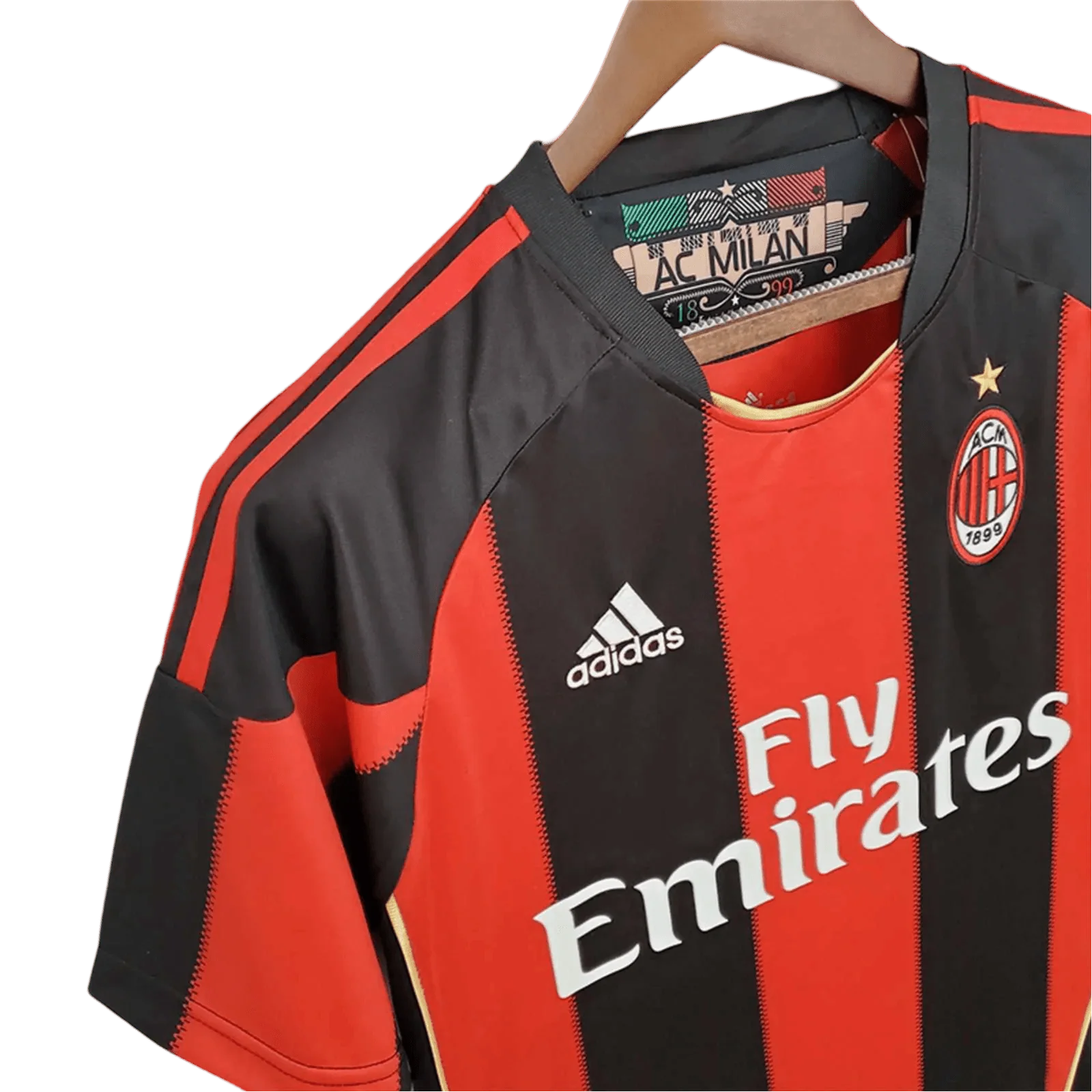 https://cdn.shopify.com/s/files/1/0826/7228/8075/files/20102011-ac-milan-fly-emirates-home-retro-kit-834800.webp?v=1741197282