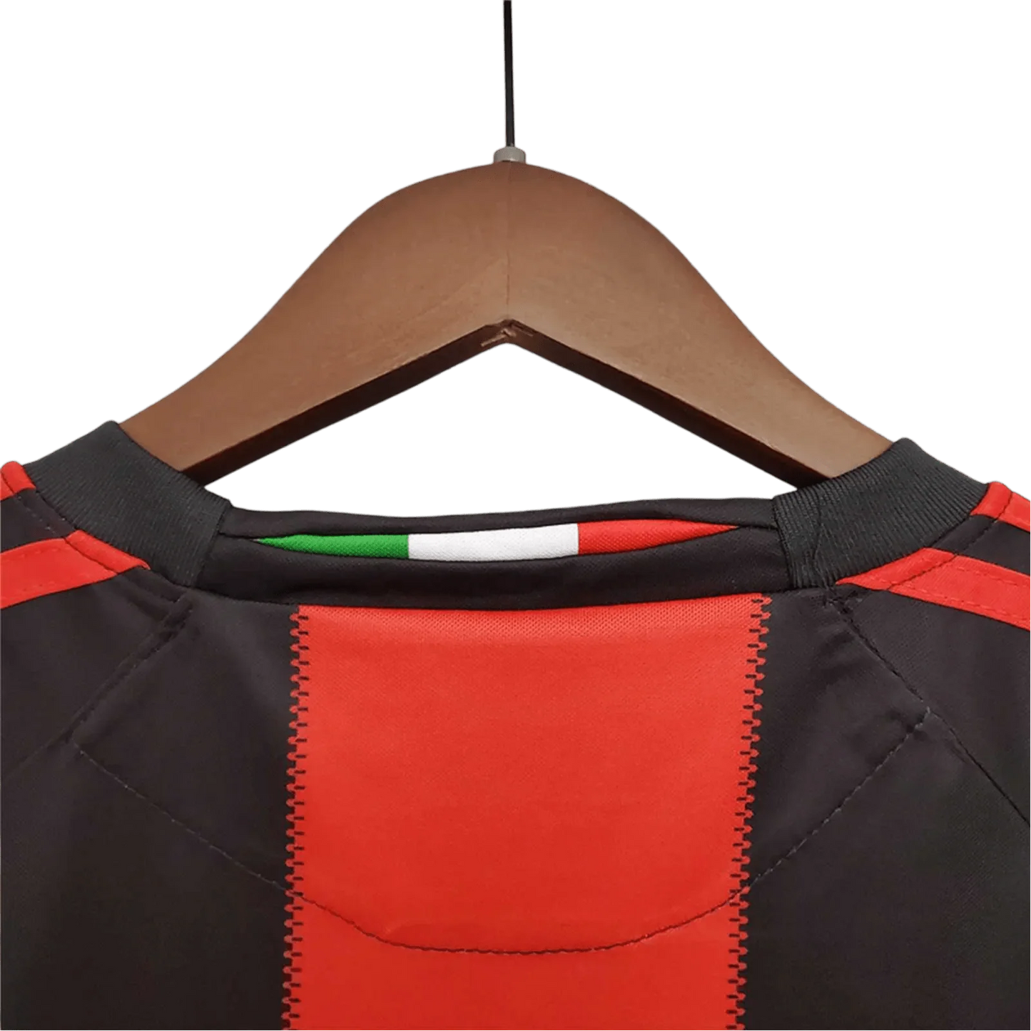 https://cdn.shopify.com/s/files/1/0826/7228/8075/files/20102011-ac-milan-fly-emirates-home-retro-kit-892892.webp?v=1741197284