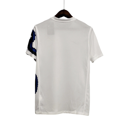 https://cdn.shopify.com/s/files/1/0826/7228/8075/files/20102011-inter-milan-pirelli-away-retro-kit-412126.webp?v=1741197554