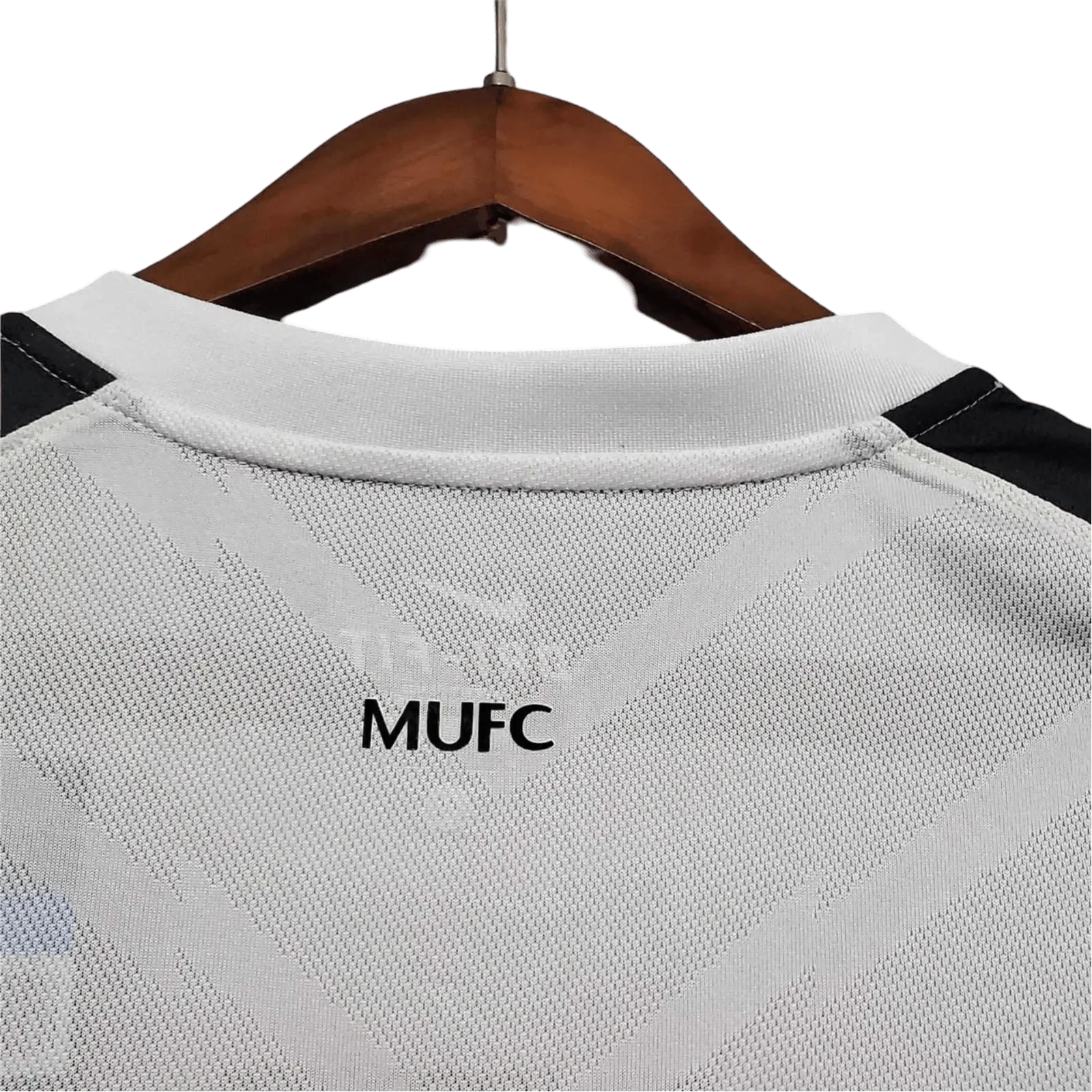 https://cdn.shopify.com/s/files/1/0826/7228/8075/files/20102011-manchester-united-aon-away-retro-kit-classickits433-374114.webp?v=1741197673