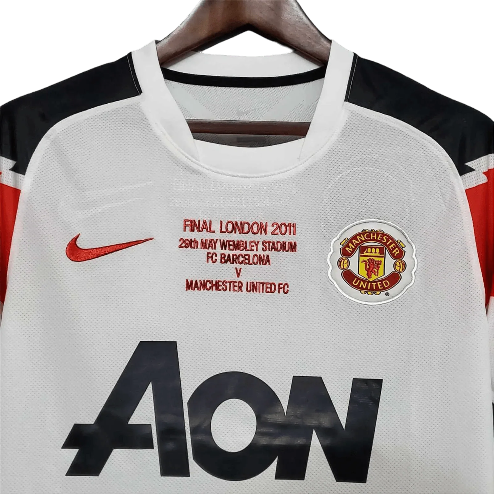 https://cdn.shopify.com/s/files/1/0826/7228/8075/files/20102011-manchester-united-aon-away-retro-kit-classickits433-910570.webp?v=1741197672