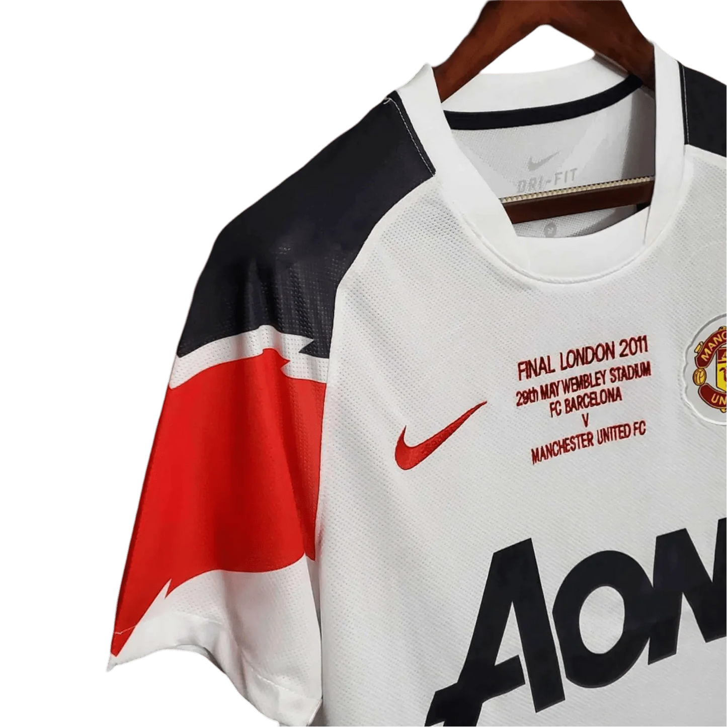 https://cdn.shopify.com/s/files/1/0826/7228/8075/files/20102011-manchester-united-aon-away-retro-kit-classickits433-982906.webp?v=1741197670