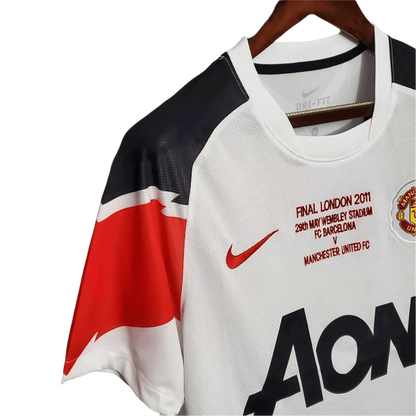 https://cdn.shopify.com/s/files/1/0826/7228/8075/files/20102011-manchester-united-aon-away-retro-kit-classickits433-982906.webp?v=1741197670