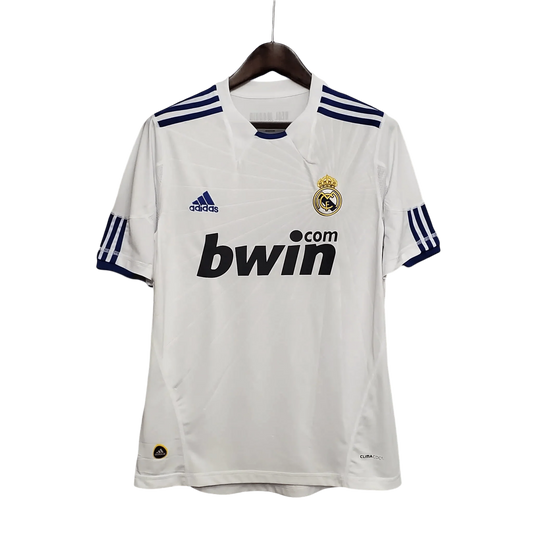 https://cdn.shopify.com/s/files/1/0826/7228/8075/files/20102011-real-madrid-bwin-home-retro-kit-268173.webp?v=1741197462