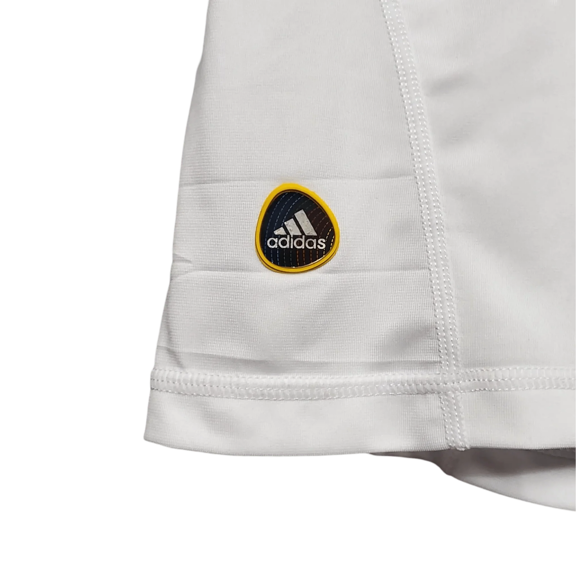https://cdn.shopify.com/s/files/1/0826/7228/8075/files/20102011-real-madrid-bwin-home-retro-kit-490352.webp?v=1741197458