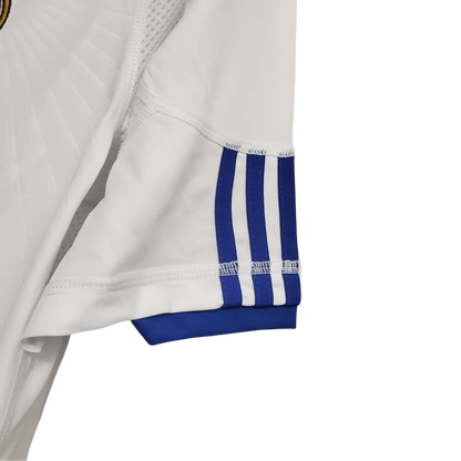 https://cdn.shopify.com/s/files/1/0826/7228/8075/files/20102011-real-madrid-bwin-home-retro-kit-537446.webp?v=1741197459