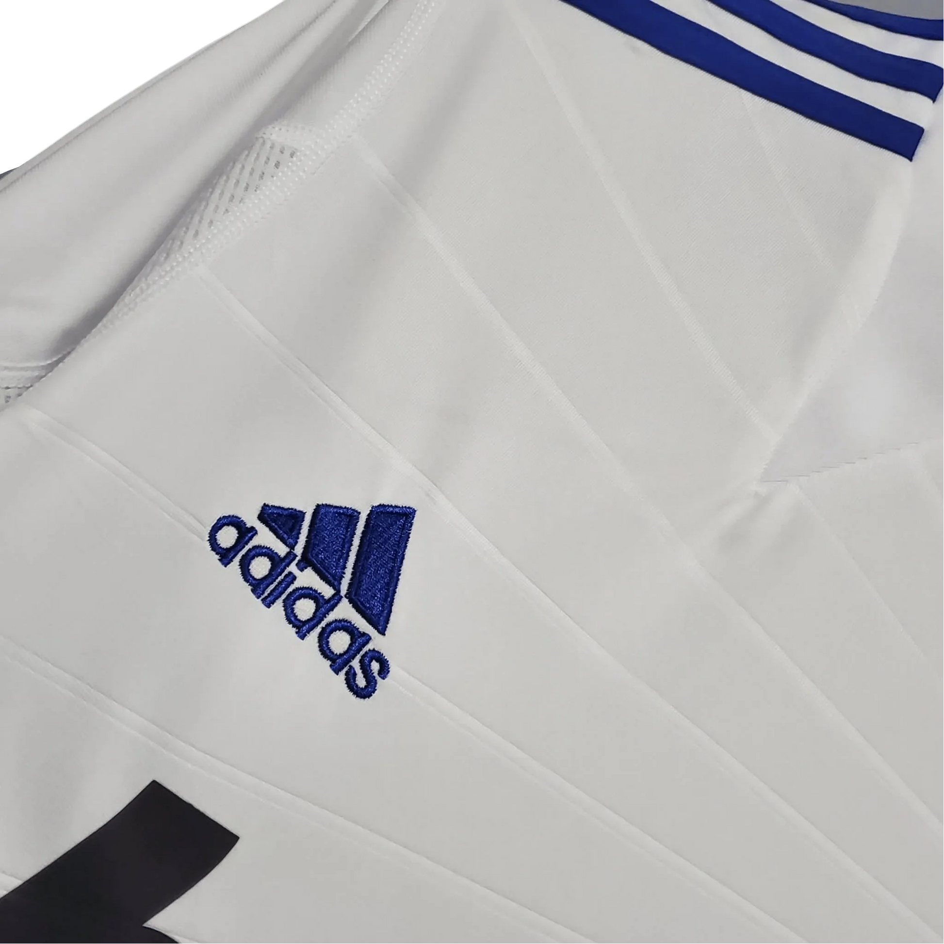 https://cdn.shopify.com/s/files/1/0826/7228/8075/files/20102011-real-madrid-bwin-home-retro-kit-580524.webp?v=1741197462