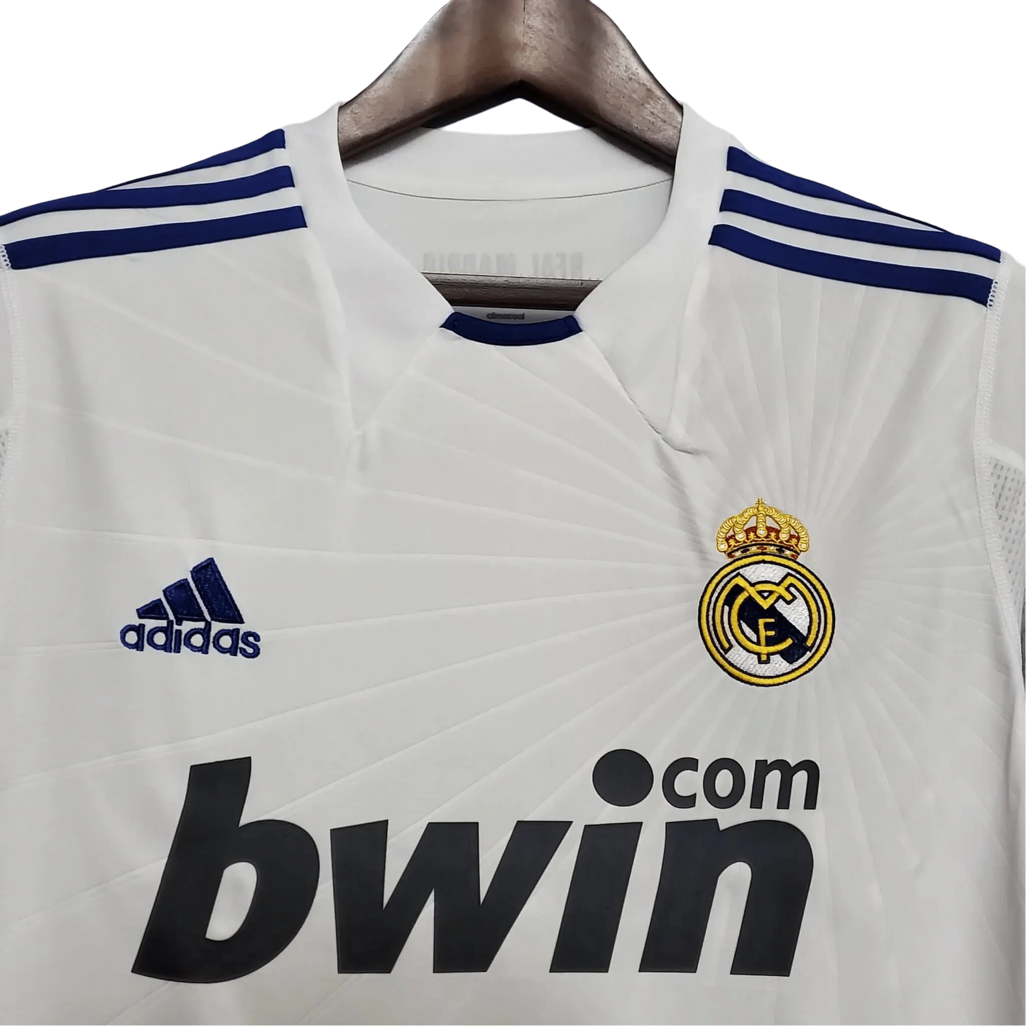 https://cdn.shopify.com/s/files/1/0826/7228/8075/files/20102011-real-madrid-bwin-home-retro-kit-679844.webp?v=1741197459