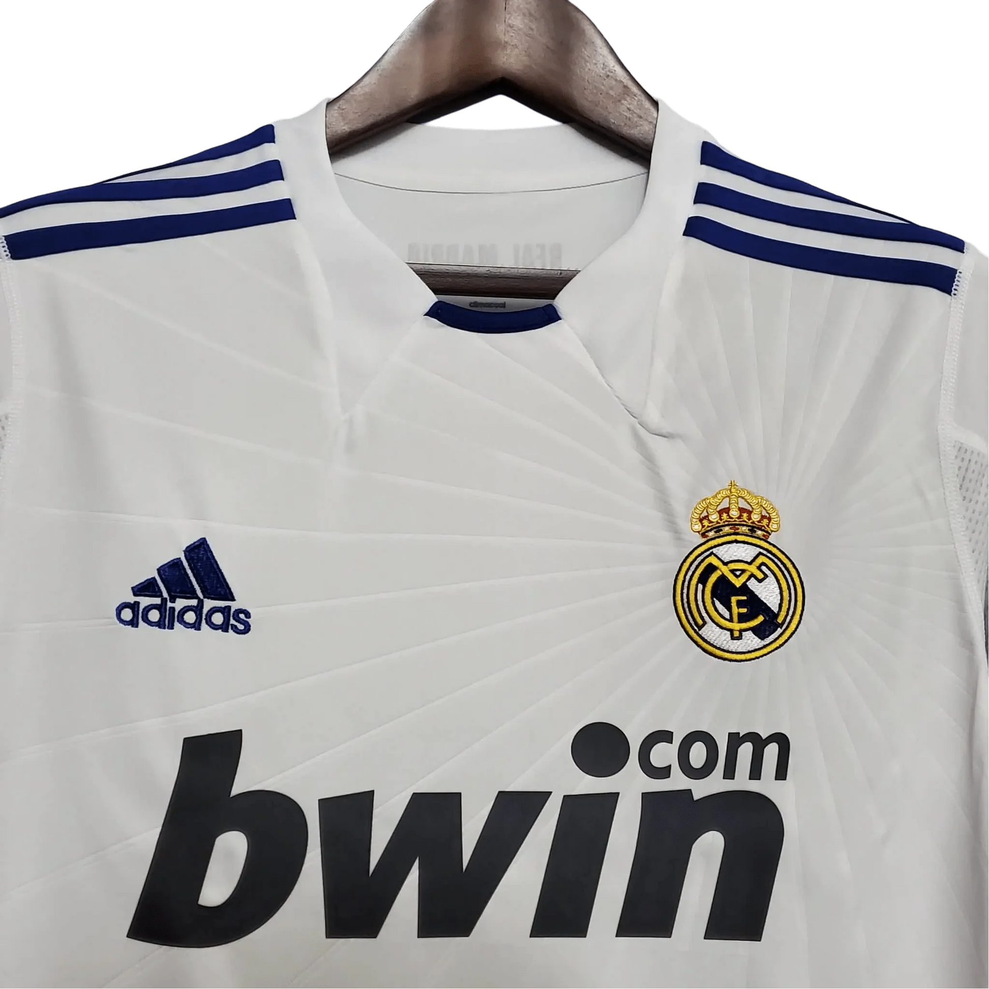 https://cdn.shopify.com/s/files/1/0826/7228/8075/files/20102011-real-madrid-bwin-home-retro-kit-679844.webp?v=1741197459