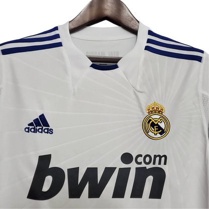 https://cdn.shopify.com/s/files/1/0826/7228/8075/files/20102011-real-madrid-bwin-home-retro-kit-679844.webp?v=1741197459