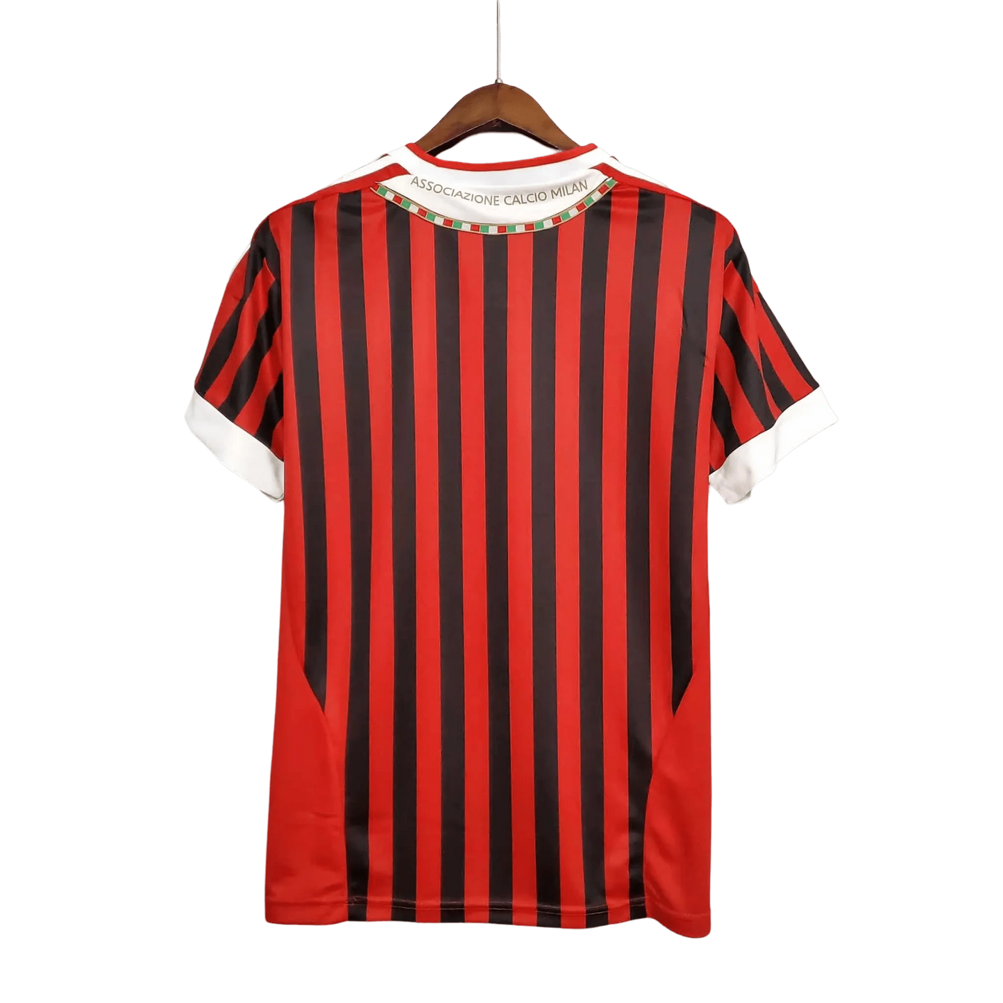 https://cdn.shopify.com/s/files/1/0826/7228/8075/files/20112012-ac-milan-fly-emirates-home-retro-kit-666568.webp?v=1741197294