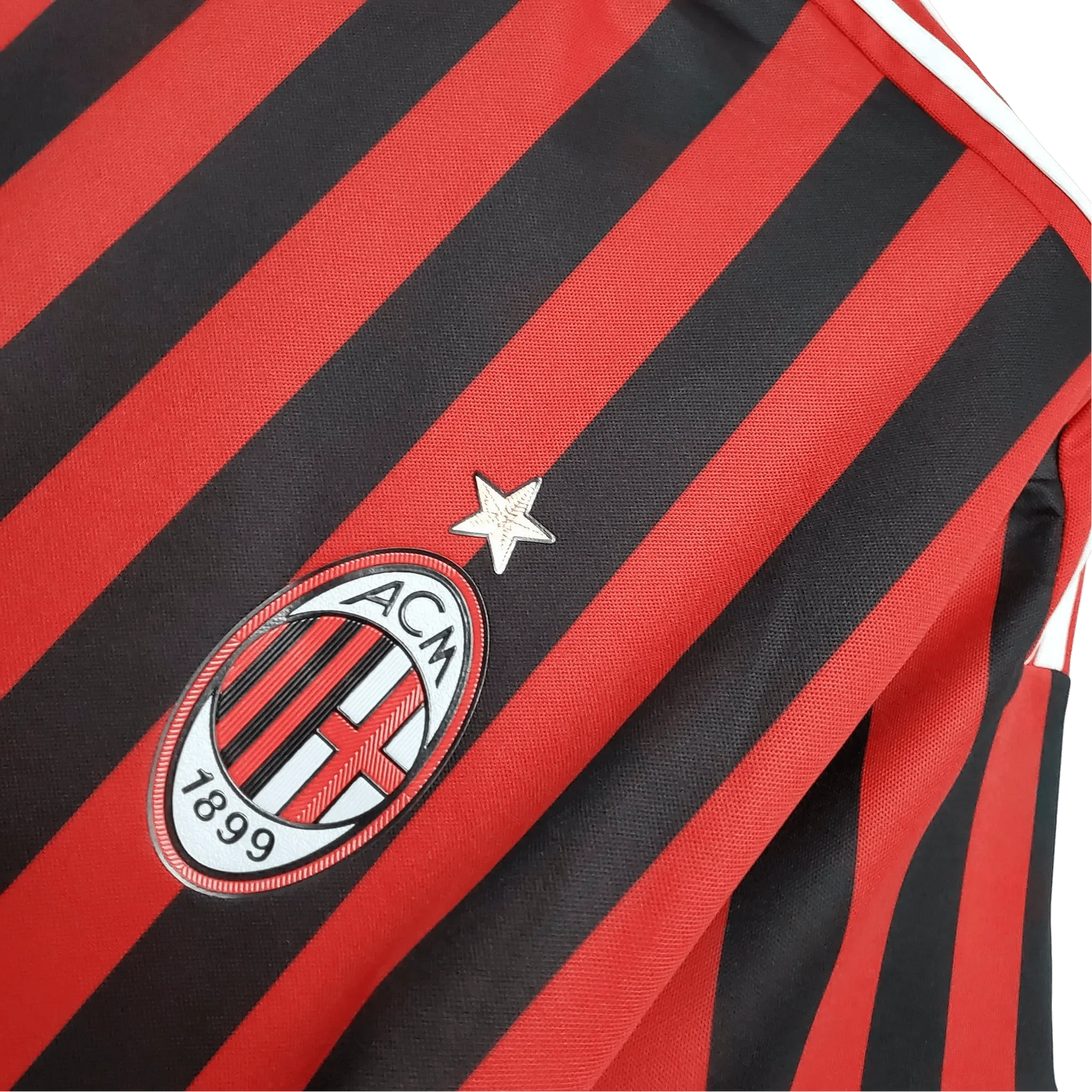 https://cdn.shopify.com/s/files/1/0826/7228/8075/files/20112012-ac-milan-fly-emirates-home-retro-kit-859041.webp?v=1741197294