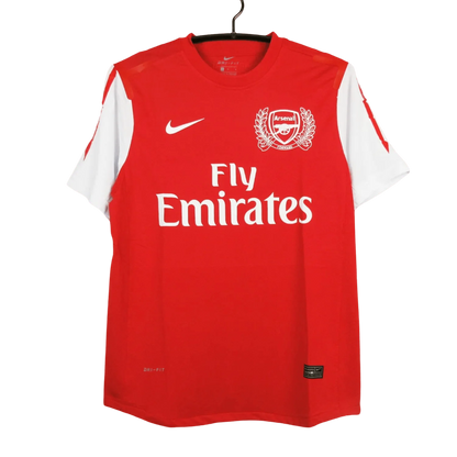 https://cdn.shopify.com/s/files/1/0826/7228/8075/files/20112012-arsenal-fly-emirates-home-retro-kit-classickits433-648267.webp?v=1741198349