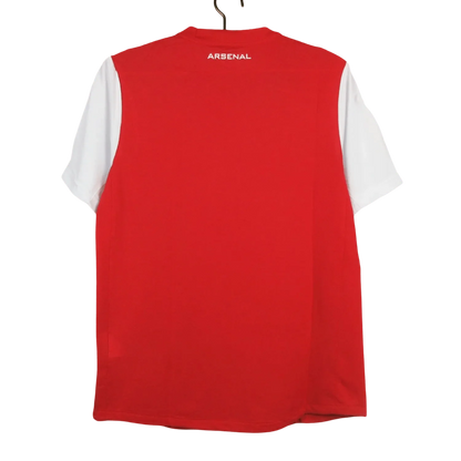 https://cdn.shopify.com/s/files/1/0826/7228/8075/files/20112012-arsenal-fly-emirates-home-retro-kit-classickits433-949029.webp?v=1741198347