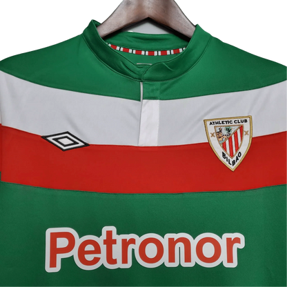 https://cdn.shopify.com/s/files/1/0826/7228/8075/files/20112012-athletic-bilbao-petronor-away-retro-kit-classickits433-138578.webp?v=1741198353
