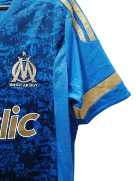 https://cdn.shopify.com/s/files/1/0826/7228/8075/files/20112012-olympique-de-marseille-betclic-blue-away-retro-jersey-947654.webp?v=1741197998