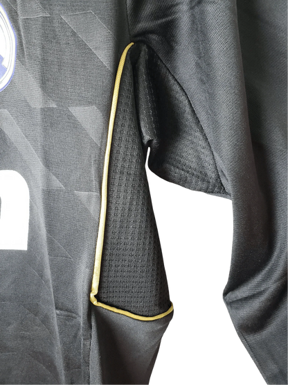 https://cdn.shopify.com/s/files/1/0826/7228/8075/files/20112012-real-madrid-bwin-away-retro-kit-long-sleeve-685578.webp?v=1741197457