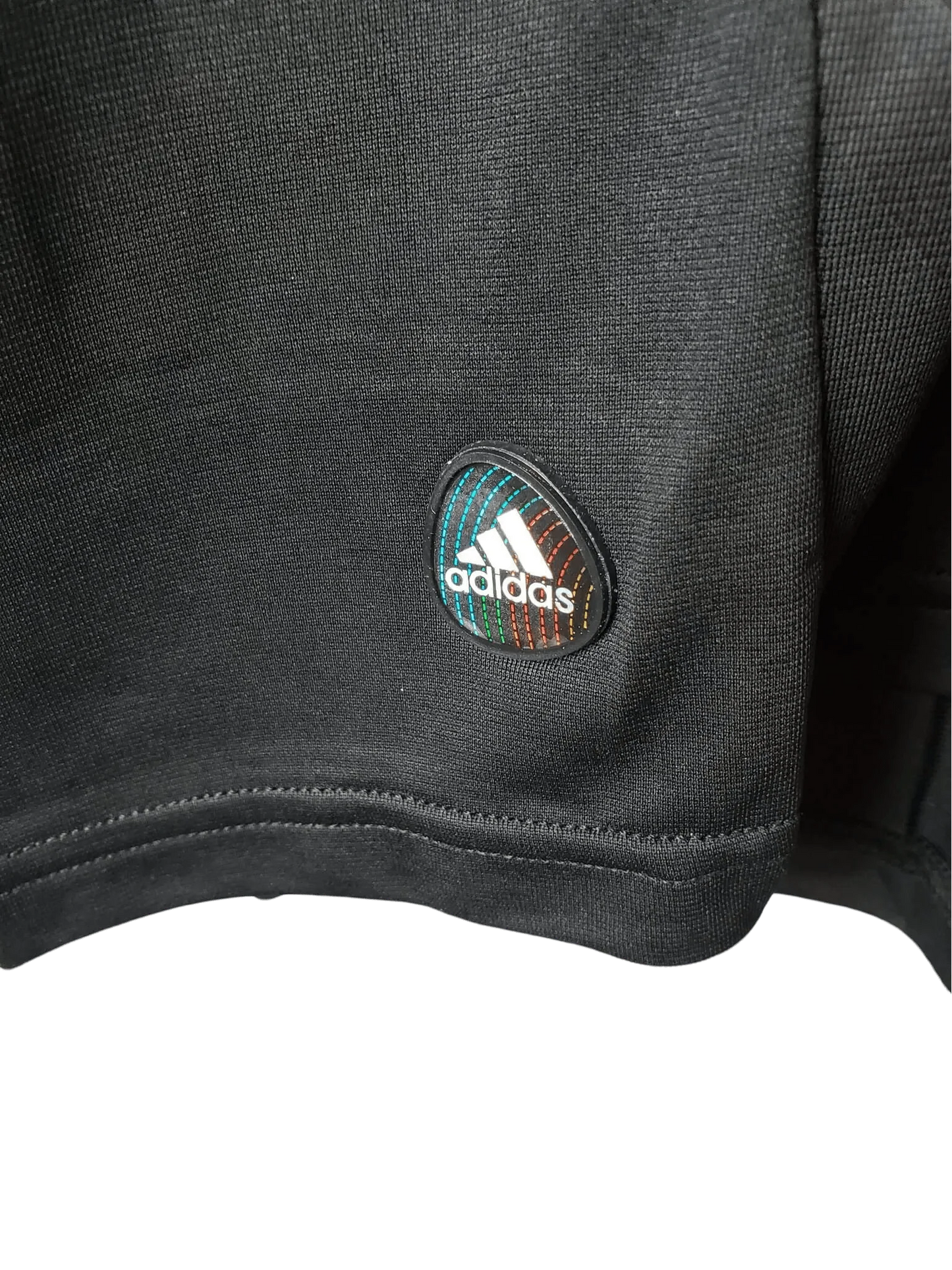 https://cdn.shopify.com/s/files/1/0826/7228/8075/files/20112012-real-madrid-bwin-away-retro-kit-long-sleeve-728649.webp?v=1741197459