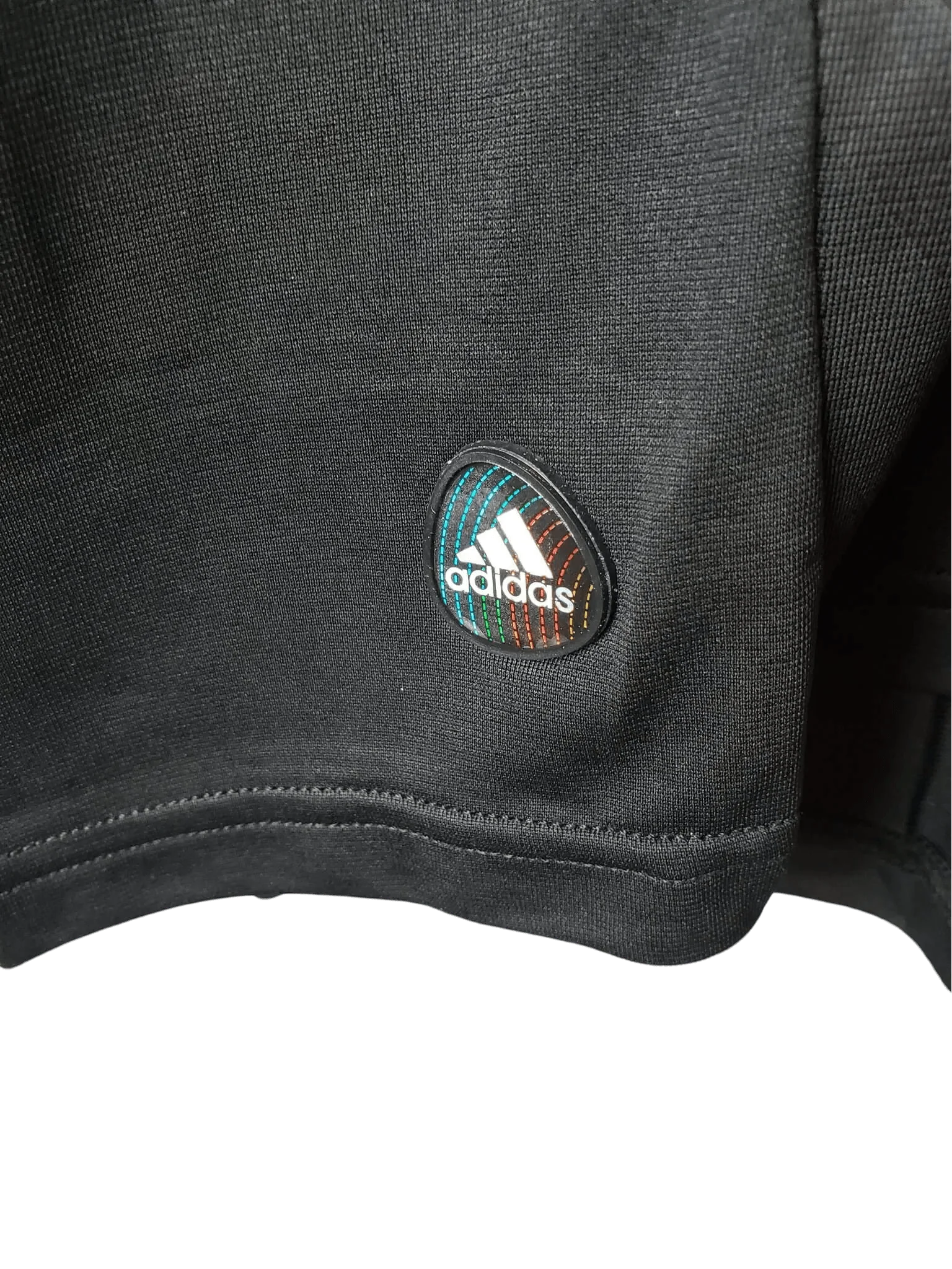 https://cdn.shopify.com/s/files/1/0826/7228/8075/files/20112012-real-madrid-bwin-away-retro-kit-long-sleeve-728649.webp?v=1741197459