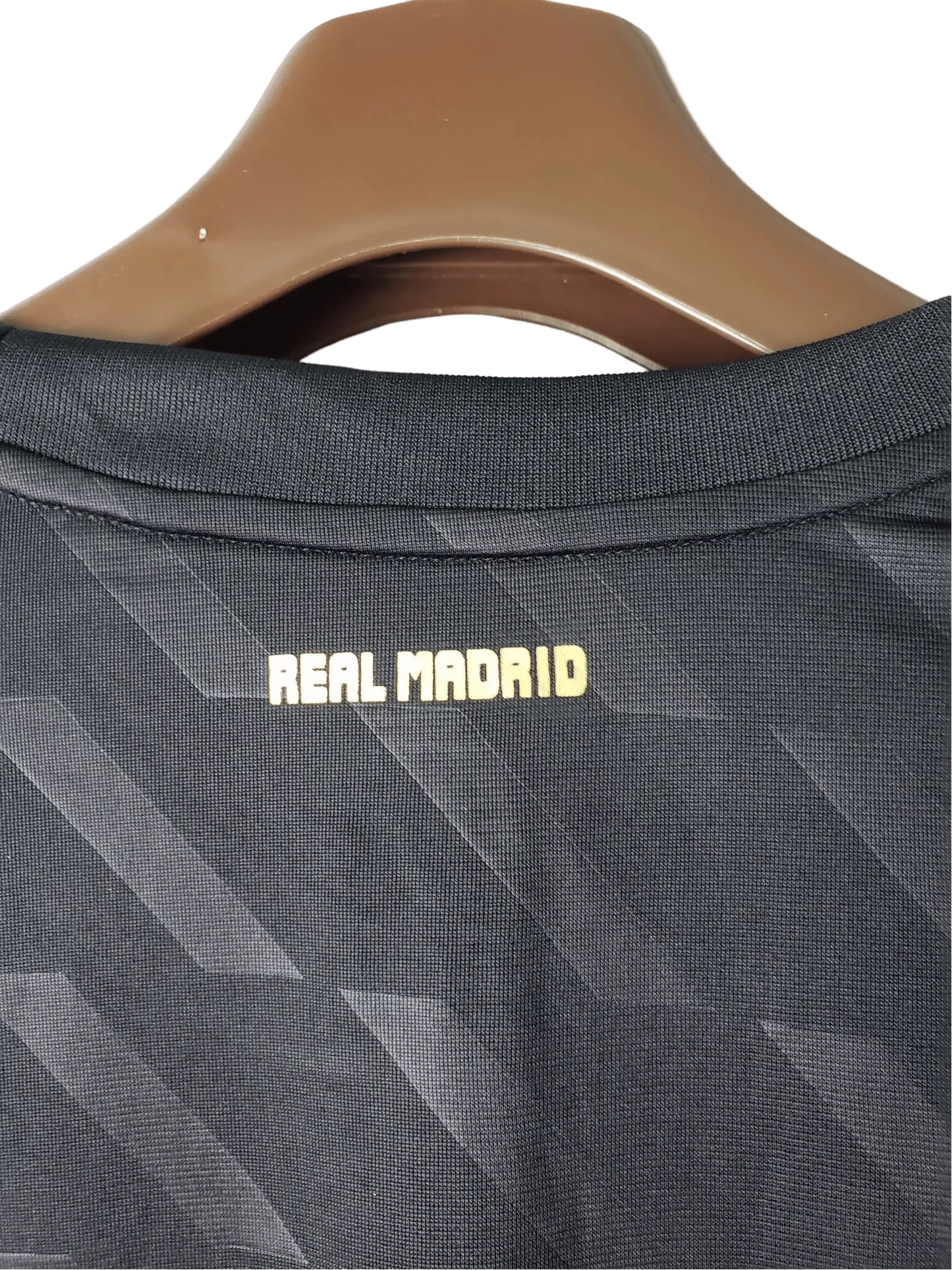 https://cdn.shopify.com/s/files/1/0826/7228/8075/files/20112012-real-madrid-bwin-away-retro-kit-long-sleeve-807463.webp?v=1741197458