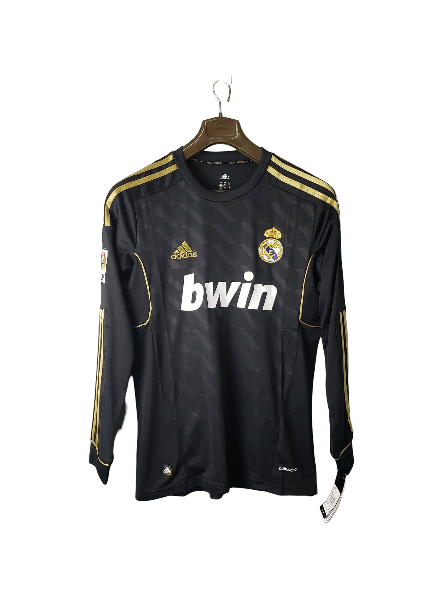 https://cdn.shopify.com/s/files/1/0826/7228/8075/files/20112012-real-madrid-bwin-away-retro-kit-long-sleeve-977558.webp?v=1741197455