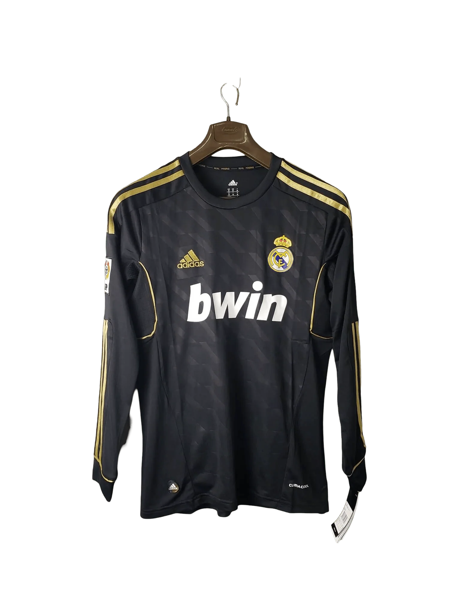 https://cdn.shopify.com/s/files/1/0826/7228/8075/files/20112012-real-madrid-bwin-away-retro-kit-long-sleeve-977558.webp?v=1741197455