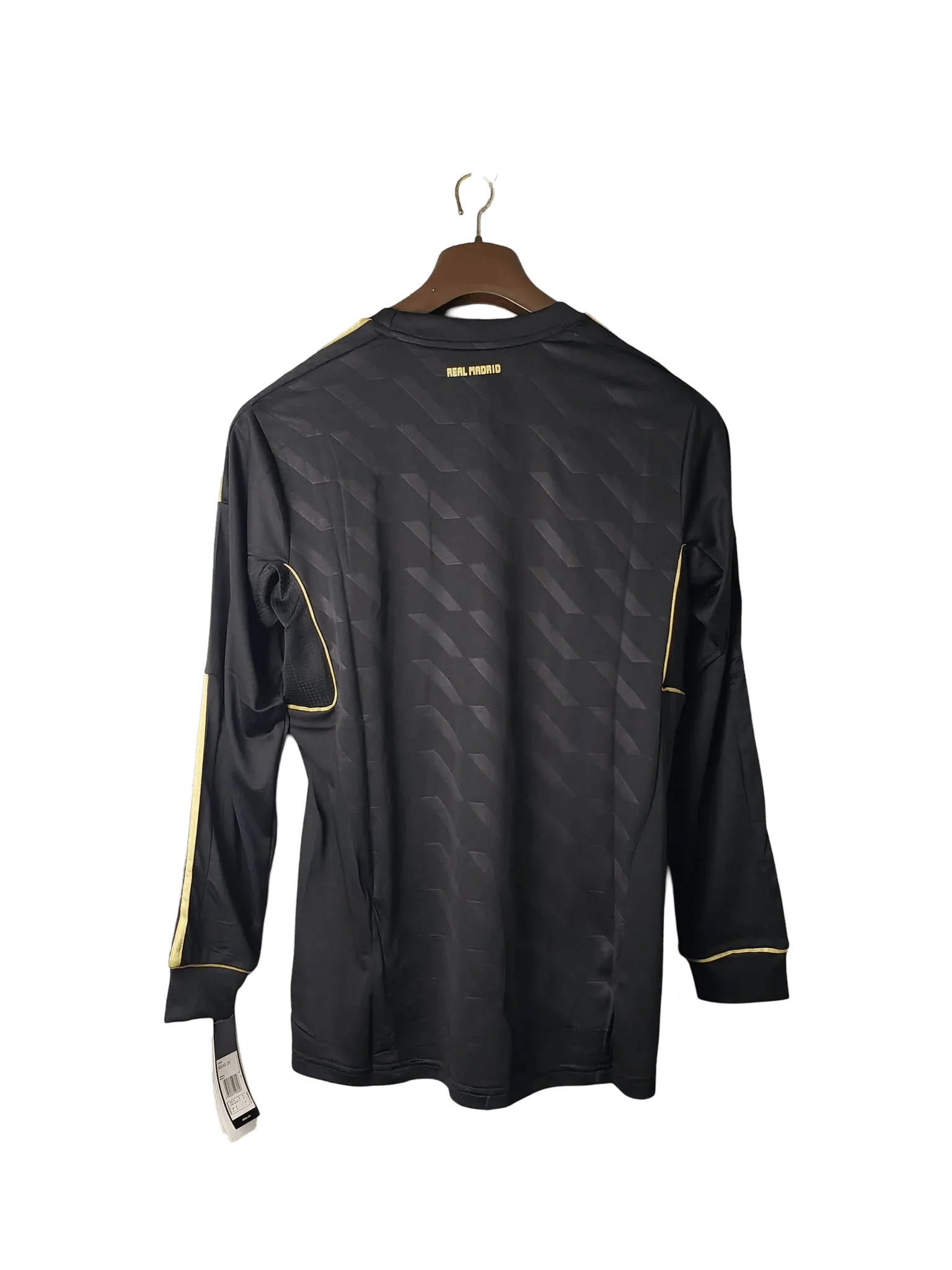 https://cdn.shopify.com/s/files/1/0826/7228/8075/files/20112012-real-madrid-bwin-away-retro-kit-long-sleeve-985514.webp?v=1741197455