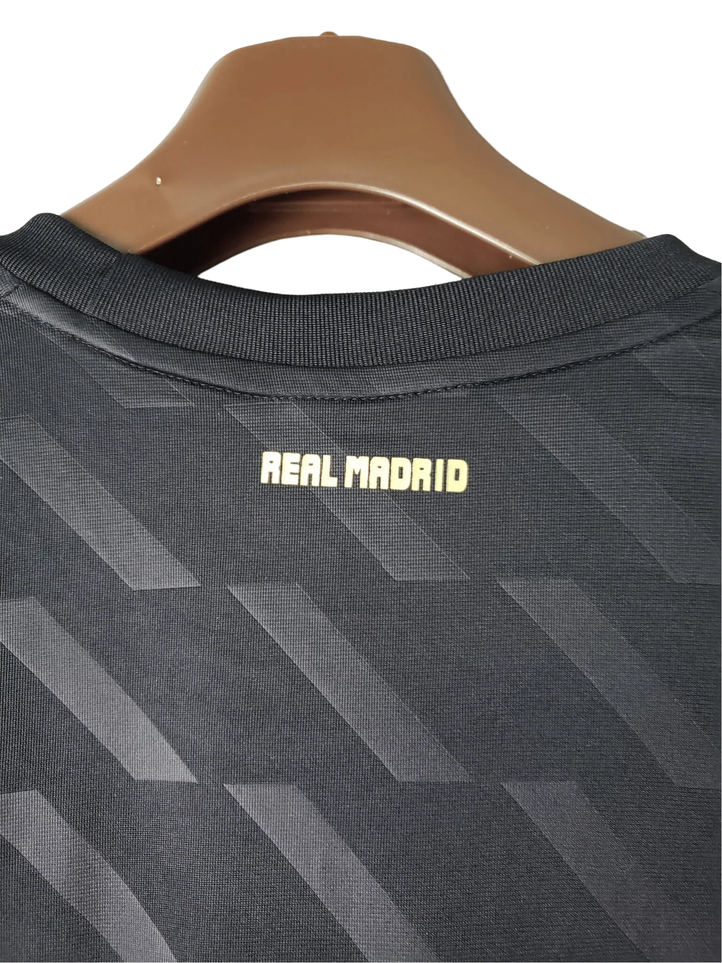 https://cdn.shopify.com/s/files/1/0826/7228/8075/files/20112012-real-madrid-bwin-away-retro-kit-short-sleeve-328471.webp?v=1741197470