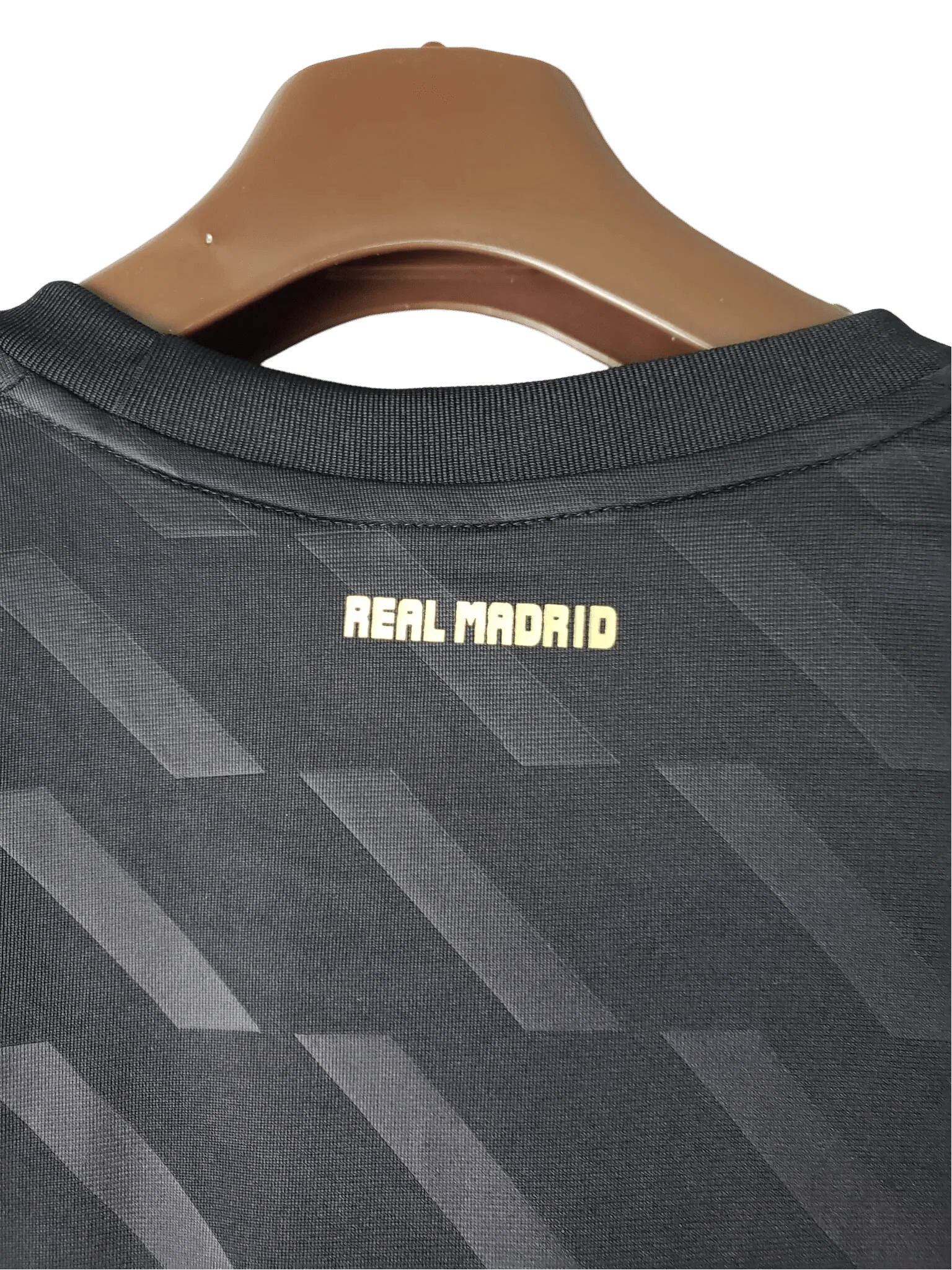https://cdn.shopify.com/s/files/1/0826/7228/8075/files/20112012-real-madrid-bwin-away-retro-kit-short-sleeve-328471.webp?v=1741197470