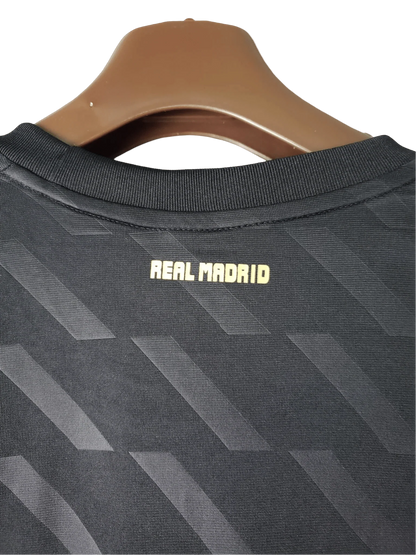 https://cdn.shopify.com/s/files/1/0826/7228/8075/files/20112012-real-madrid-bwin-away-retro-kit-short-sleeve-328471.webp?v=1741197470