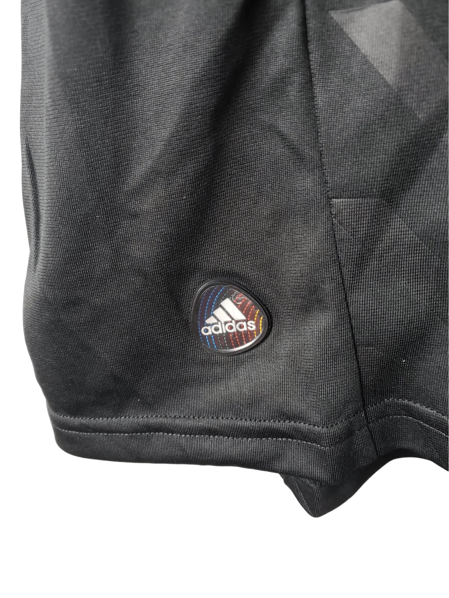 https://cdn.shopify.com/s/files/1/0826/7228/8075/files/20112012-real-madrid-bwin-away-retro-kit-short-sleeve-703429.webp?v=1741197467