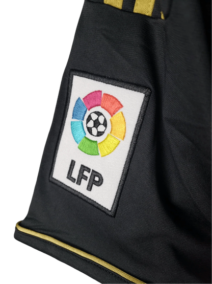 https://cdn.shopify.com/s/files/1/0826/7228/8075/files/20112012-real-madrid-bwin-away-retro-kit-short-sleeve-830997.webp?v=1741197468