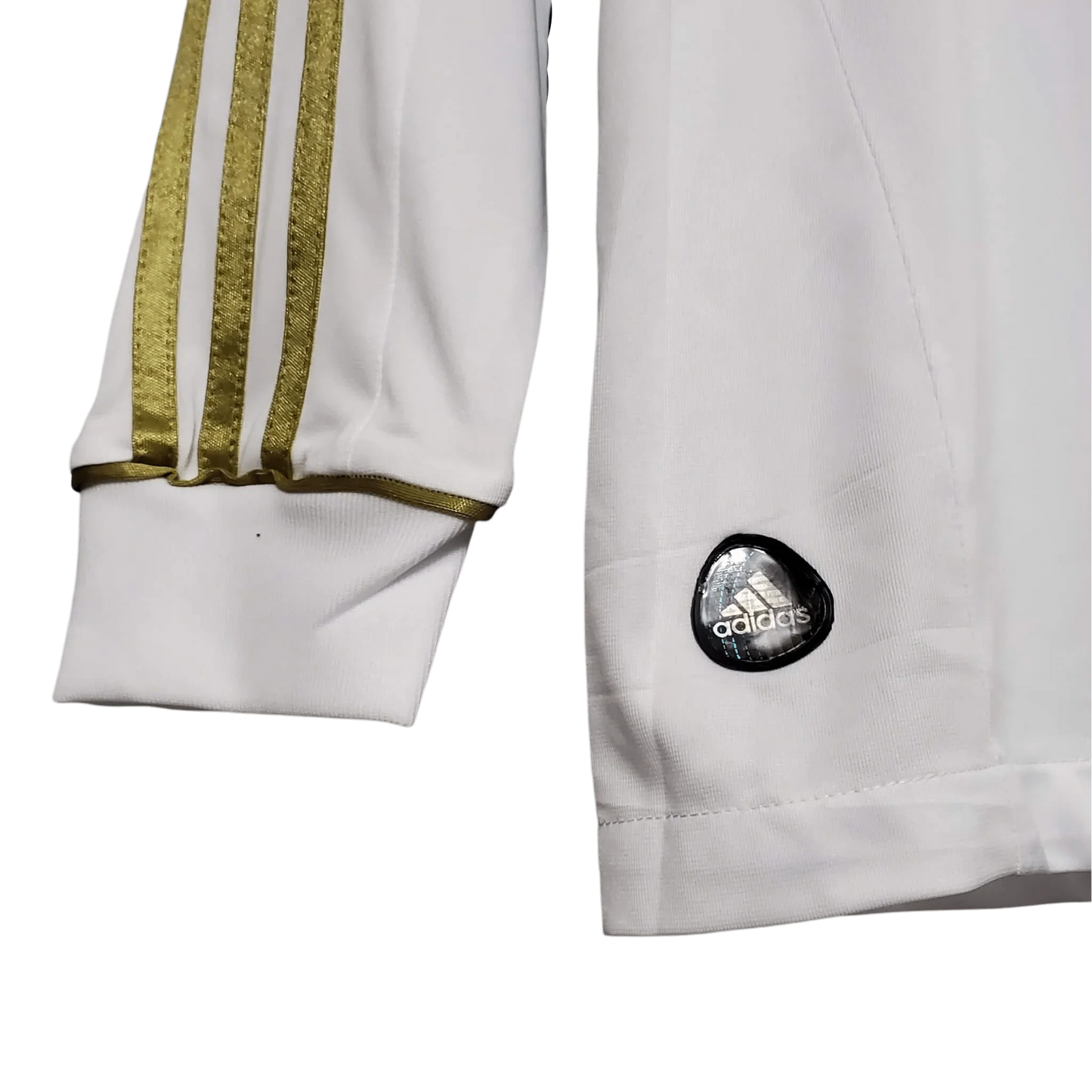 https://cdn.shopify.com/s/files/1/0826/7228/8075/files/20112012-real-madrid-bwin-home-retro-kit-long-sleeve-322891.webp?v=1741197494
