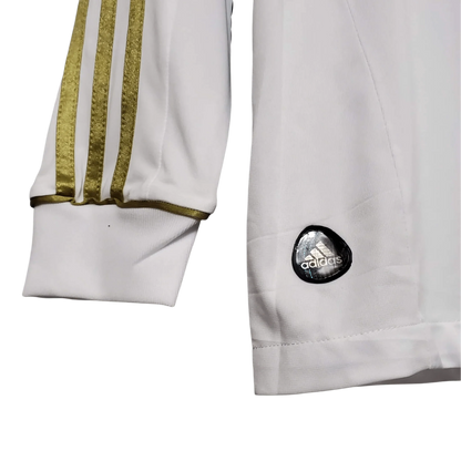 https://cdn.shopify.com/s/files/1/0826/7228/8075/files/20112012-real-madrid-bwin-home-retro-kit-long-sleeve-322891.webp?v=1741197494