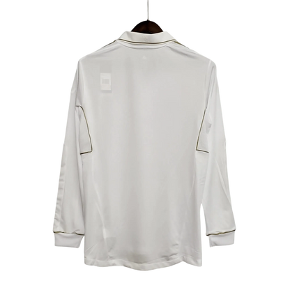 https://cdn.shopify.com/s/files/1/0826/7228/8075/files/20112012-real-madrid-bwin-home-retro-kit-long-sleeve-551085.webp?v=1741197492
