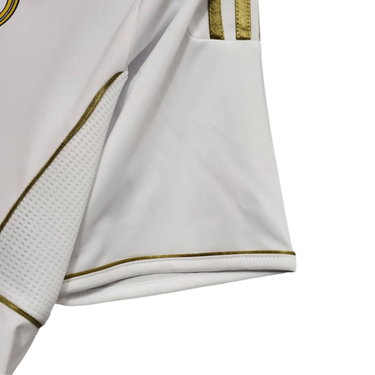 https://cdn.shopify.com/s/files/1/0826/7228/8075/files/20112012-real-madrid-bwin-home-retro-kit-short-sleeve-334368.webp?v=1741197492