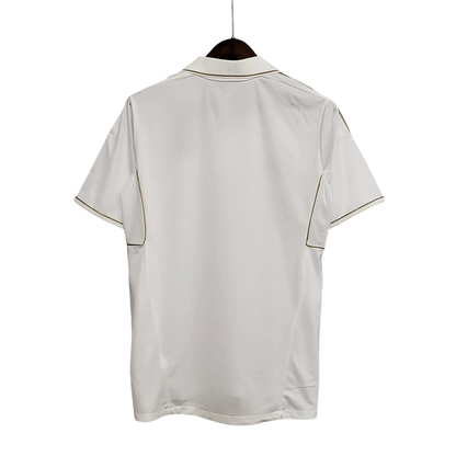 https://cdn.shopify.com/s/files/1/0826/7228/8075/files/20112012-real-madrid-bwin-home-retro-kit-short-sleeve-457581.webp?v=1741197490