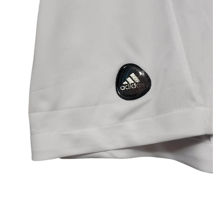 https://cdn.shopify.com/s/files/1/0826/7228/8075/files/20112012-real-madrid-bwin-home-retro-kit-short-sleeve-517996.webp?v=1741197489