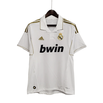 https://cdn.shopify.com/s/files/1/0826/7228/8075/files/20112012-real-madrid-bwin-home-retro-kit-short-sleeve-616037.webp?v=1741197491