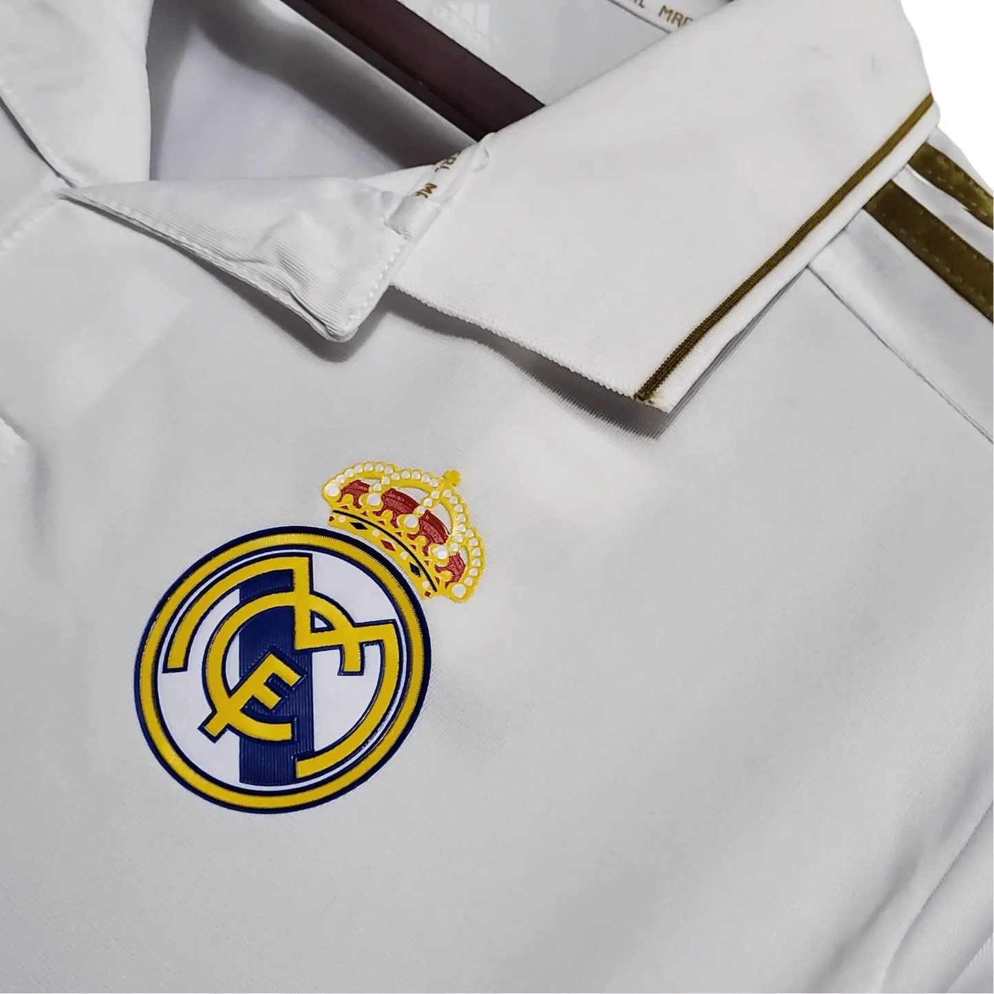 https://cdn.shopify.com/s/files/1/0826/7228/8075/files/20112012-real-madrid-bwin-home-retro-kit-short-sleeve-841012.webp?v=1741197491